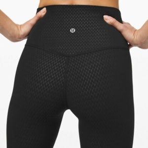 Lululemon align legging 25”. Size 2. Black with speckled detailing